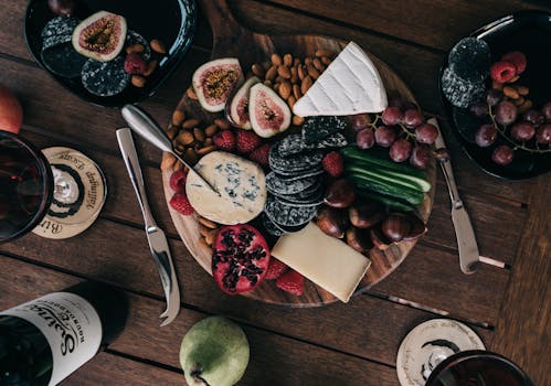 a glass of wine on a healthy meal table