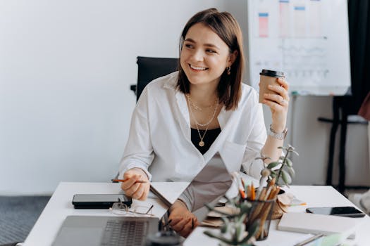 a person enjoying coffee while working