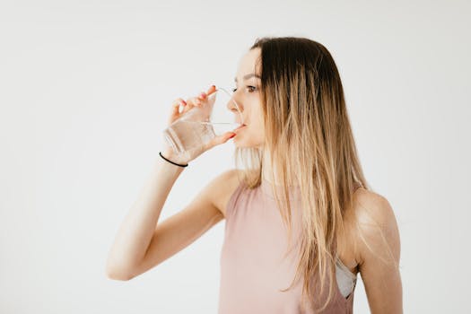 a fitness enthusiast enjoying a drink