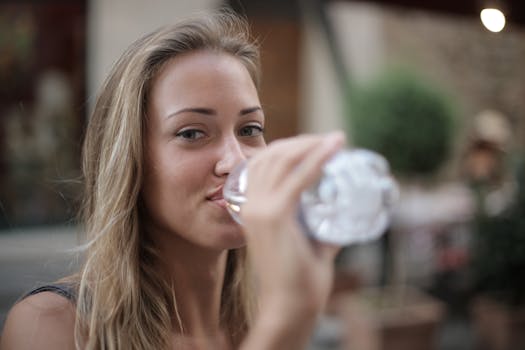 image of a person drinking water