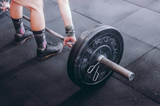 image of a person lifting weights