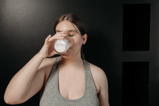 image of a person enjoying a healthy drink