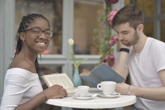 person enjoying tea while reading