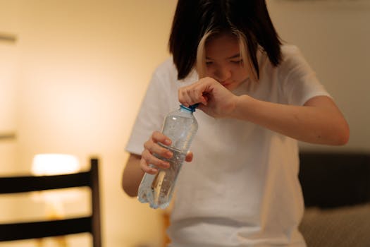 person holding a water bottle