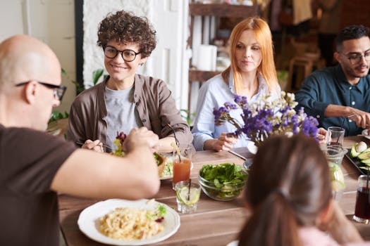 image of a happy group sharing meals